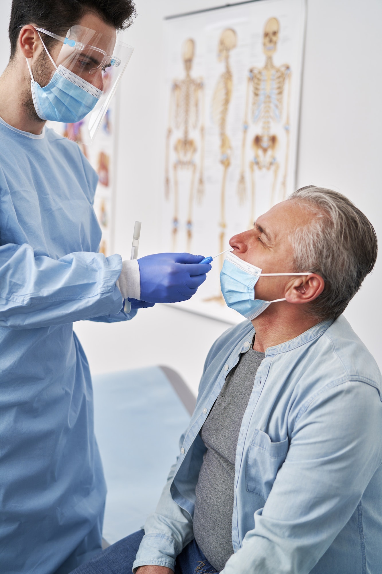 Vertical image of patient during taking sample for coronavirus testing